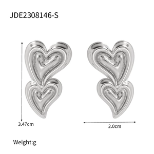 Detailed view of silver heart earrings measuring 3.47cm by 2.0cm with model JDE2308146-S