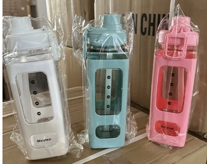 Three square plastic sport bottles in white, blue and pink with handles and straws