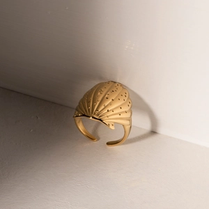 18K gold plated stainless steel shell ring with textured dot details in a luxury style