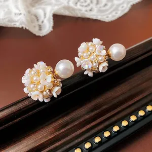 Silver needle pearl stud earrings with zircon flower clusters in a luxury style