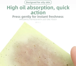 Detail of linen facial oil blotting paper showing high absorption effect on translucent sheet