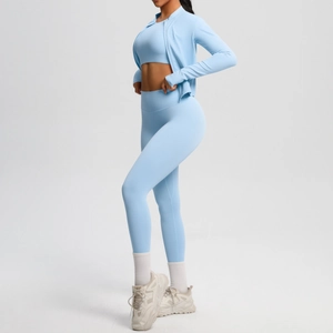 Three-piece light blue yoga set with zipper jacket, sports bra and high-waist leggings