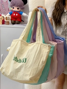 Lightweight drawstring canvas tote bag for women in five pastel colors with walking print