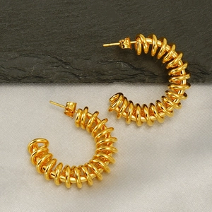 Chic golden stainless steel C-shaped spring hoop earrings with polished metallic finish
