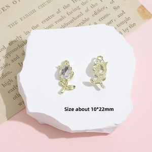 Detailed view of 10x22mm gold rose charms with teardrop zircon for DIY jewelry making