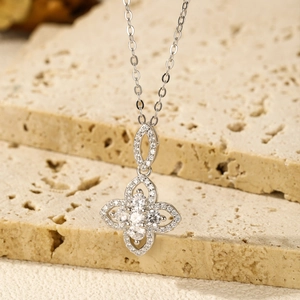 Elegant S925 sterling silver floral necklace with sparkling zircon on a textured stone base