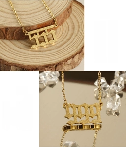 Detailed view of gold plated stainless steel 111-999 lucky number necklace pendant