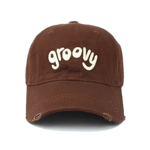 Vintage distressed dark brown baseball cap with white groovy letter embroidery