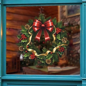 Festive Christmas wreath with red bow and pine cones on a window frame wall sticker