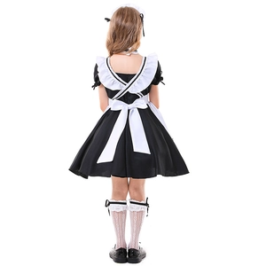 Classic black and white kids maid costume featuring large back bow and apron detail