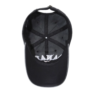 Distressed black cotton baseball cap with white CANADA embroidery on brim interior