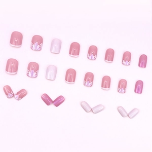 Pink French style press-on nail kit with floral patterns and 24 square-round tips