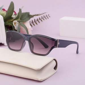 Fashionable square sunglasses with purple gradient lenses and translucent dark gray frames