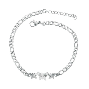 Detailed view of silver butterfly charms on a stainless steel Figaro chain bracelet