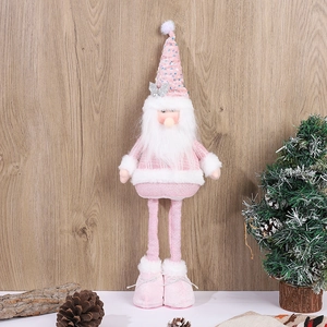 Detail of pink Christmas gnome featuring sequin hat, long legs, and white faux fur trim