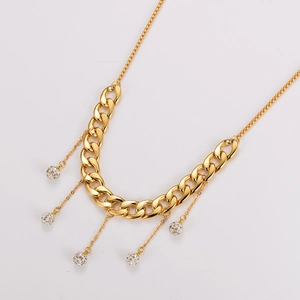 Vintage stainless steel Cuban chain necklace with sparkling diamond-set sphere tassels