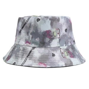 Detail of grey, white and pink camouflage bucket hat featuring cartoon bear and text print