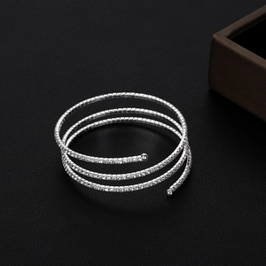 Detail of silver multi-layer spiral bridal bracelet with sparkling crystal rhinestones