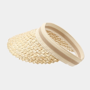 Detailed view of hand-woven straw visor edge with unique triangular sawtooth pattern