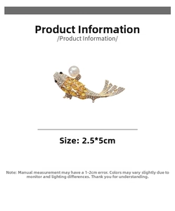 Detail view of a gold koi fish brooch with yellow crystals and pearl, size 2.5x5cm