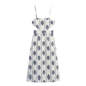 White midi dress with blue leaf print, spaghetti straps, and waist cut-out detailing