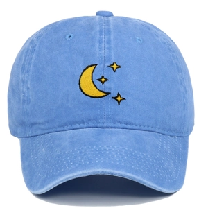 Washed blue baseball cap with yellow moon and stars embroidery and adjustable strap