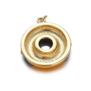 Detailed view of a gold plated donut charm with textured metal finish for bracelets