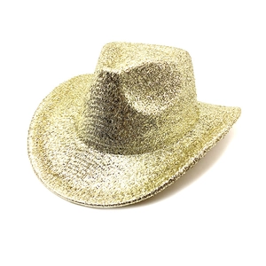 Detail of western cowboy hat featuring glittering gold sequins and metallic sparkle finish