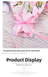 Detail of pink floral greeting card featuring a silk bow and elegant lily pattern design