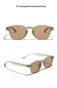 Detailed view of transparent avocado green sunglasses with brown lenses and metal rivets