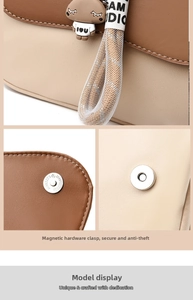 Close-up of contrast color backpack flap featuring dual magnetic buckle closure and cute charm