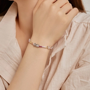 Macro detail of S925 sterling silver tennis bracelet with colorful zircon stones on wrist