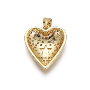 Detail view of a gold-plated heart pendant with pave zircons and a hollow star back
