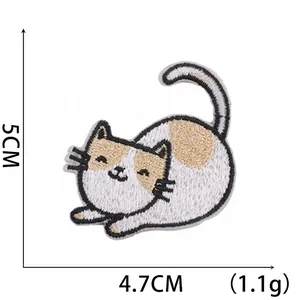 Detailed view of smiling cat embroidery patch with 5cm height and 4.7cm width dimensions