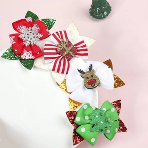 Set of 4 Christmas glitter bow hair clips for girls featuring reindeer and tree patterns