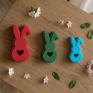 Bunny silicone molds with heart cutout and stitch texture in red green and blue
