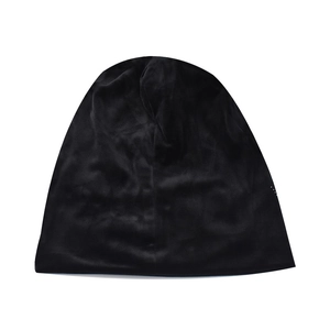 Detailed view of the smooth black satin texture on this warm winter chenille beanie