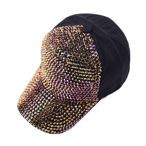 Detail of colorful rhinestones on black cotton baseball cap with metallic shimmer