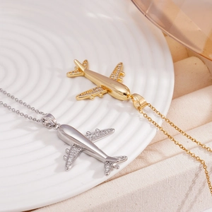 Chic gold and silver airplane pendant necklaces with crystal inlay on a stylish O-chain
