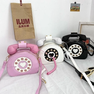 Creative vintage telephone shaped crossbody bag in pink white and black PU leather