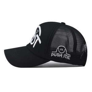 Black washed cotton trucker hat with white 3D logo embroidery and mesh side panels