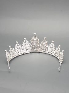 Detailed macro view of vintage bridal crown with silver alloy and clear rhinestones