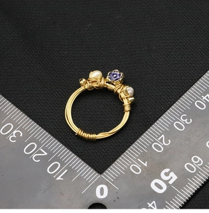 Size measurement of vintage gold wire ring with natural pearls and blue floral charms
