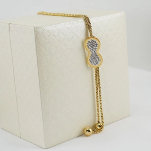 Lunga collana a V in acciaio inossidabile placcato oro 18K con strass su portagioie