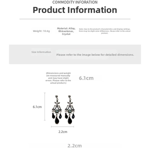 Detailed view of vintage earrings with blue crystals and black teardrop pendants