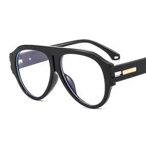 Retro oversized aviator sunglasses with black frames and gold metal temple accents