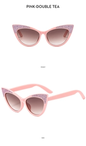 Detailed view of pink cat eye sunglasses for girls with sparkling rhinestone accents