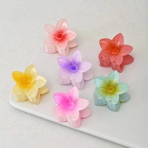 Set of six colorful 4cm matte plastic flower hair claws in various gradient shades