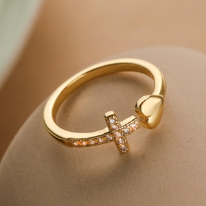 Elegant gold plated heart and cross open ring with sparkling cubic zirconia on stone base