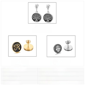 Detailed view of Tree of Life and Eye of Horus stud earrings in steel and gold finish